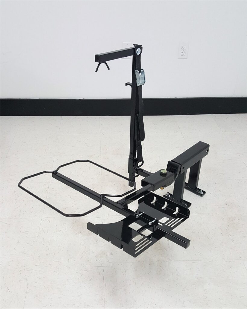 Tote Model 003 carrier showing hold down strap and drawbar mounting section